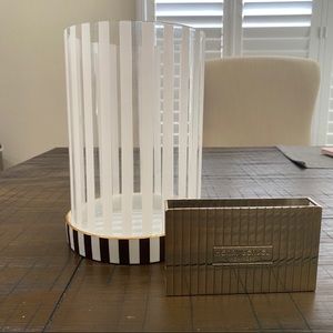 Henri Bendel hurricane with match box holder.